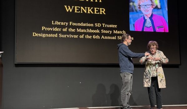 Library Shop SD Manager Scott Ehrig-Burgess with Library Foundation SD Trustee Judith Wenker at the Shorties.